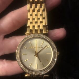 Michael Kors watch missing 6 small gems not too noticeable